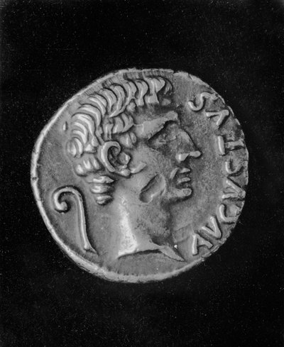 Portrait of Emperor Augustus, on the reverse side of a coin of Julia, daughter of Augustus by Roman